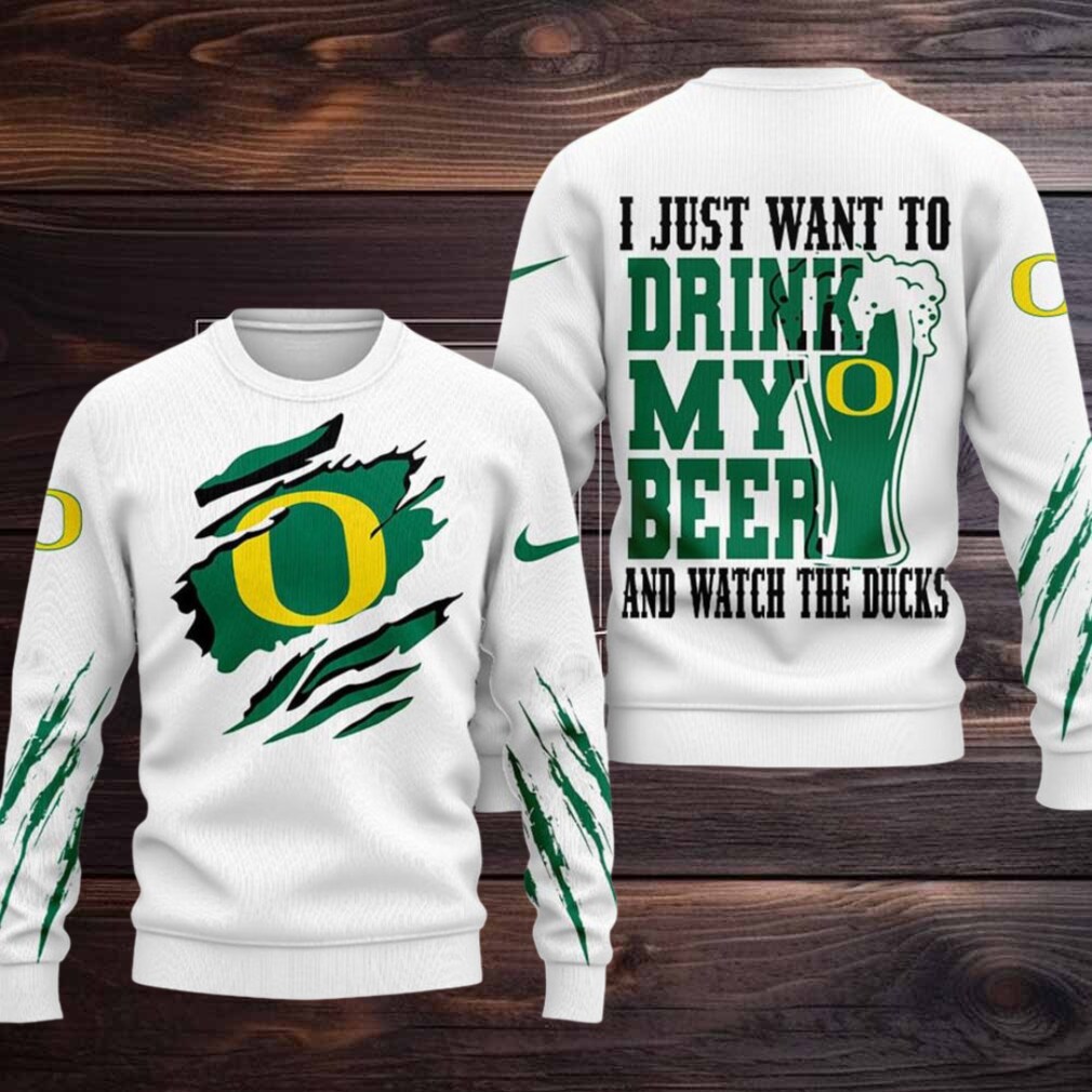 Oregon Ducks NCAA I Just Want To Drink My Beer And Watch Aggies Ugy Christmas Sweater Oregon Ducks NCAA I Just Want To Drink My Beer And Watch Aggies Ugy Christmas Sweater